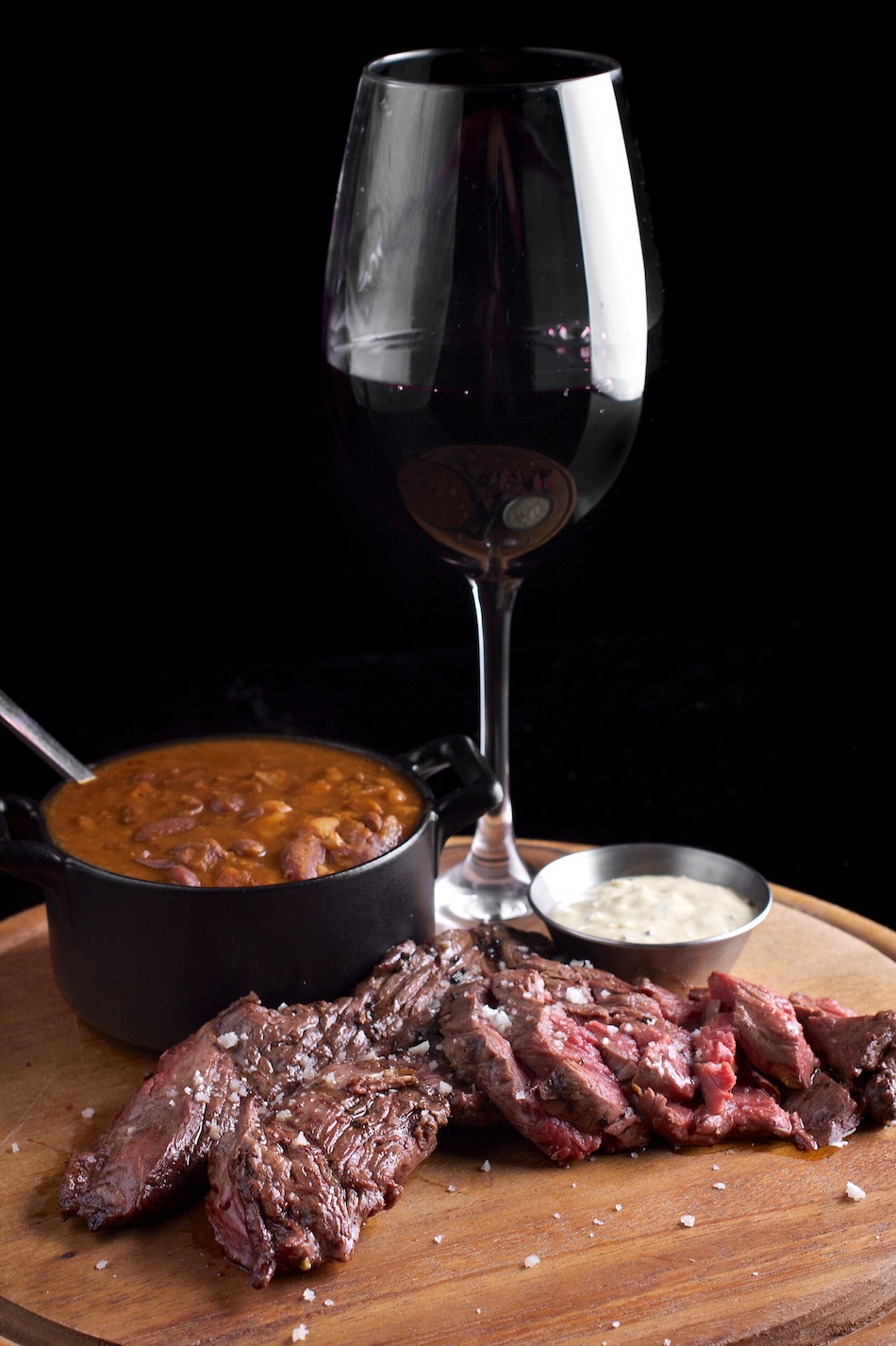 Add Some Sizzle to Your Next Dinner Party with This Mouth-watering Combination of Red Wine Jus and Steak.